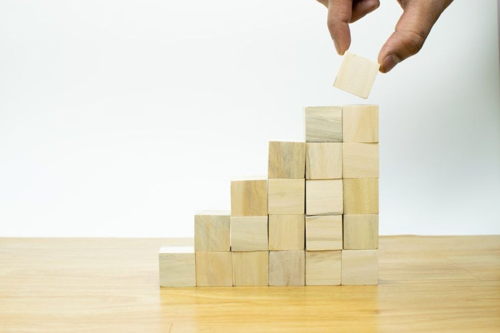 building blocks stacked representing cashflow increasing