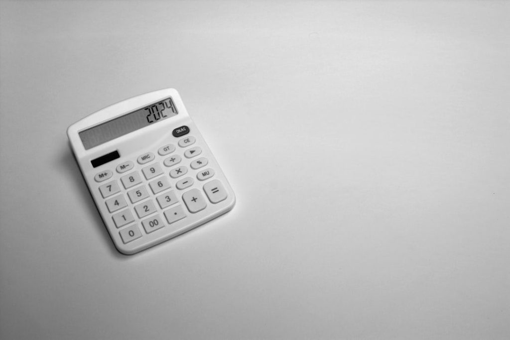 a photo of a calculator used to calculate the advantage of getting paid faster
