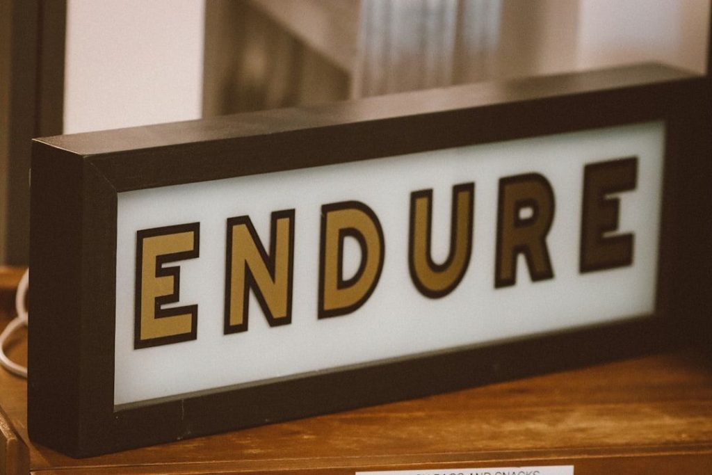 A sign that spells out the word endure, signifying Building Business Resilience.